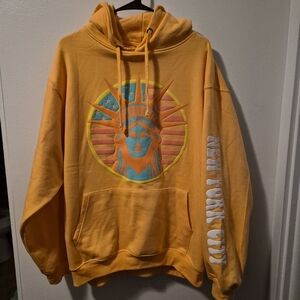 Yellow New York City Hoodie with Statue of Liberty Design